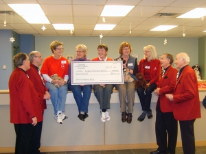 Langley Christmas Bureau Barbershop singing to volunteers